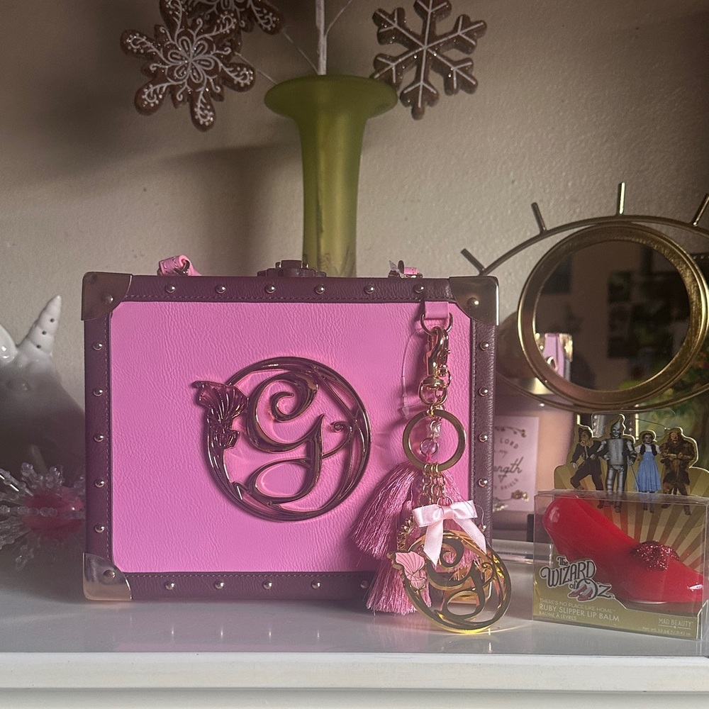 Wicked! Glinda’s Trunk Purse & Ruby Slipper Lip Balm Gift With Purchase!